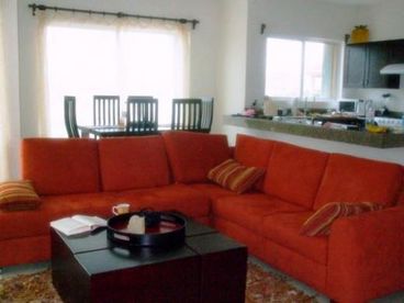 Living area with Kitchen and Dining Room in Background