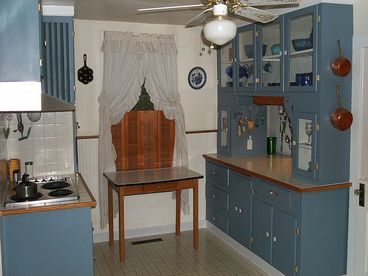 KITCHEN EQUIPPED WITH UTENSILS, POT & PANS,DISHES AND SILVERWARE, AND EVEN COFFEE.