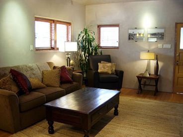 Luxurious Living Room with a Plasma Screen TV and Queen Sleeper Sofa