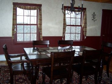 Dining area with wood stove.