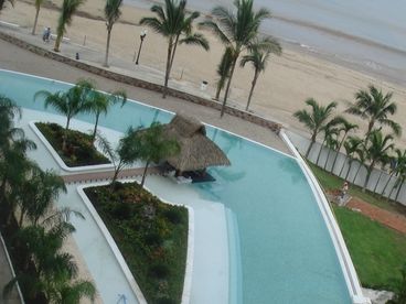View of pool and beach from terrace