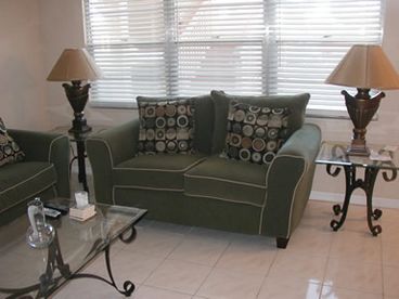 NEW DESIGNER SOFA AND LOVE SEAT.  COMFY AND MRE COMFY.