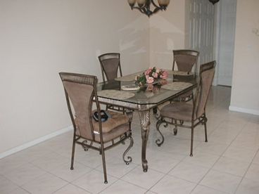 HUGE DINING ROOM WITH ENOUGH ROOM FOR 10. JUST COOK UP THOSE GREAT MEALS ..