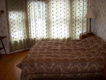 Master bedroom with a queen bed