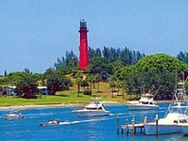 Famous Lighthouse across inlet which is enjoyed by diners as they watch the boats go by while they eat breakfast, lunch or dinner at one of their favorite restaurants - across the water.