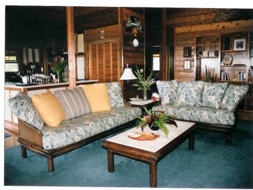 Living Room sofas are natural cotton without chemical treatments. Gorgeous hardwood floors and soaring cedar ceilings. Beautiful wood cabinetry.