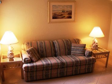 Living Room View of our Typical One-Bedroom Villa that includes a Sofa-Bed and T