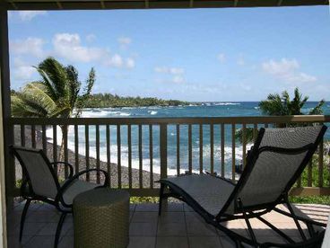 Oceanfront lanai with a view of Hana Bay and Waikaloa Beach.  

