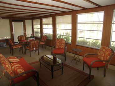 Enjoy the sunlit Sunroom that faces the waterfront views with spectacular sunset views and long sunny days in this affordable Cape Coral, Fl vacation rental. 