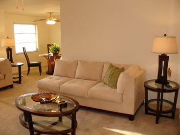 Freshly painted and just renovated, this airy waterfont home has light colors and tasteful furniture in an updated tropical style. A perfect entertaining Cape Coral vacation rental that you can afford. 