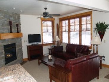The living room is equipped with a great stone fireplace to keep you warm and cozy. The Den is equipped with cable TV, CD player, and DVD player.