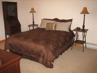 The master bedroom comes complete with a queen bed, TV, DVD player, very nice linens, a private bathroom, and walk in closet, complete enough for the most distinguished guest.