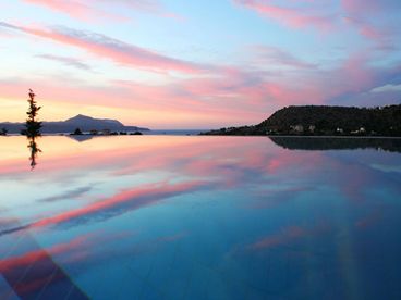 sunset over the infinity pool