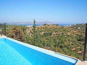 elevated position of pool gives breathtaking views over valley and out to sea