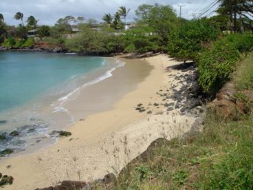 Just imagine soaking up the sun on this spectacular peaceful beach cove located just a few steps from the rental property between Kahana and Napili