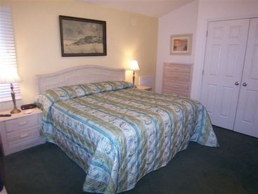 Second floor bedroom with a king bed, private bath, TV and more.