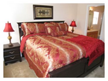 King Master Bedroom with own full ensuite bathroom, walk in closet, safe and TV