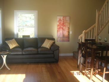 The leather couch pulls out to a comfortable sofa bed.