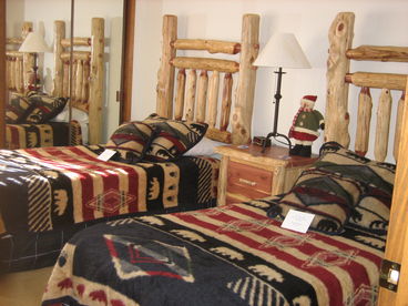 The second room has two twins.  This bedroom furniture is hand made out of cedar, in Amish Country.   