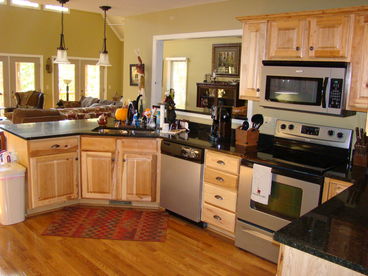 Kitchen with Upscale Appliances and Dining Area
