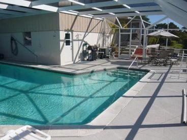 large pool with patio set, BBQ