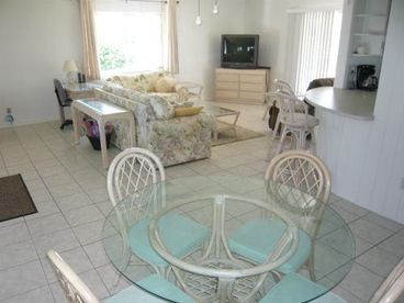 36 in  TV , 4 person dinette, sofa and love seat, tile floors, breakfast bar