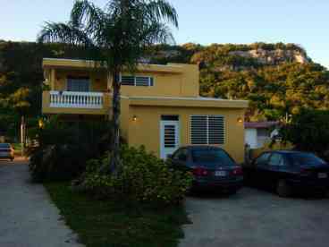 Front of property and studio apt.