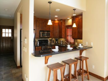 Breakfast bar and kitchen