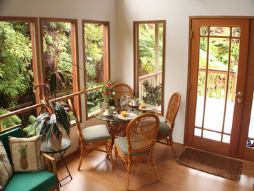 Meals by day or by night over looking the Ohia trees and giant ferns with romantic out door lighting to add to the indoor ambiance.