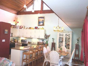 Full and stocked kitchen with breakfast bar and Dining table. Many extras include in this home!
