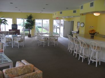 Large clubhouse with pool table, library stocked with books, and exercise room.