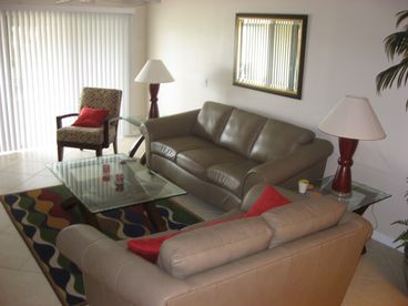 New furniture in living room. Large TV with an ocean view (if there is nothing on TV).