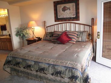 King size bed in the large master suite with a balcony facing the slopes