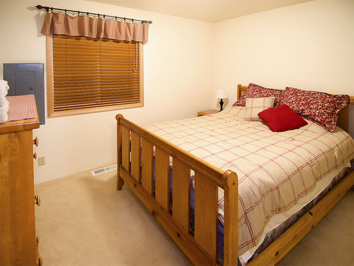 Queen size bed in both bedrooms, and a sleeping rec-room upstairs with additional bed options.