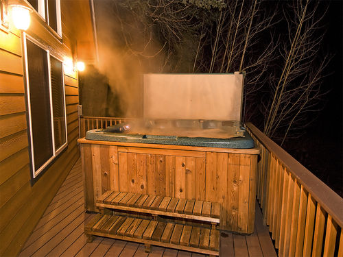 Relaxing hot tub on back deck.