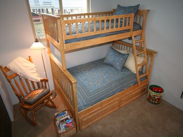 Top is Twin, Bottom is Full, Trundle is Twin.  Many kids games and books.