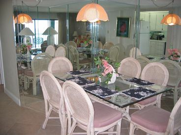 Dining Room area seats  Six ;   Note the Mirrored Walls