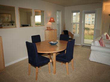 Spacious dining area perfect for gaming, jigsaw puzzles or a delicious seafood dinner.