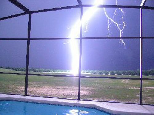 Lightning strike behind villa