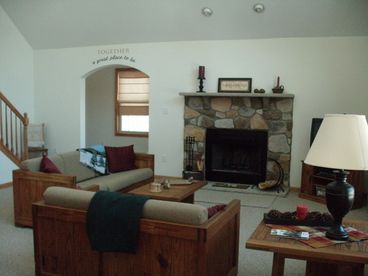 Cozy living room with stone fireplace