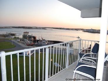 View of the Assateague Island and Bay from the fourth floor balcony.  You also have a full unobstructed view of the inlet and the Ocean. YOu can even see ponies on the beach at Assateague Island!