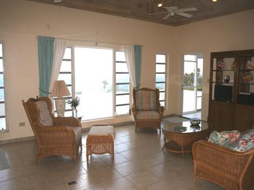 Living room with rattan furniture and 22 inch LCD TV 