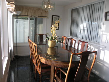 Oceanfront dining indoors or out, next to the family room and Queen bedroom on first floor. 