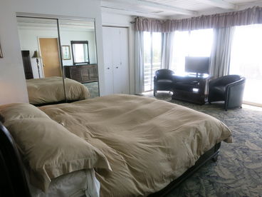 The master bedroom has a huge deck in front, with amazing ocean views! A sliding glass door to the deck
