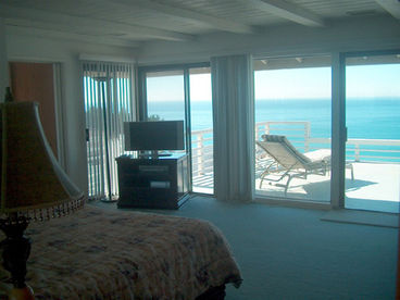 Master bedroom has a large deck for relaxing and sunning privately