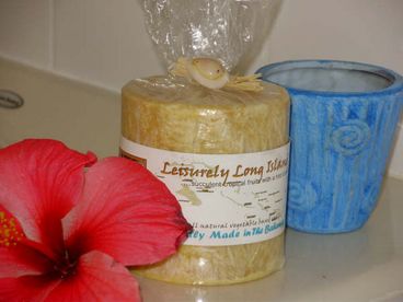 A personal touch at Villa Del Sol - Leisurely Long Island candle, and hibiscus flower.