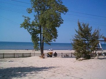 View of beach from our private yard with slide and swings for small children