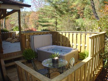 Relax in the hot tub or enjoy a cup of coffee on the deck.