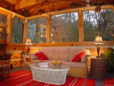 Relax and enjoy reading your favorite book in the spacious and colorful sunroom situated just off the master bedroom.