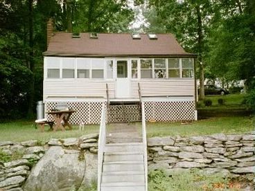 the lake side of the house, note plenty of parking up above house